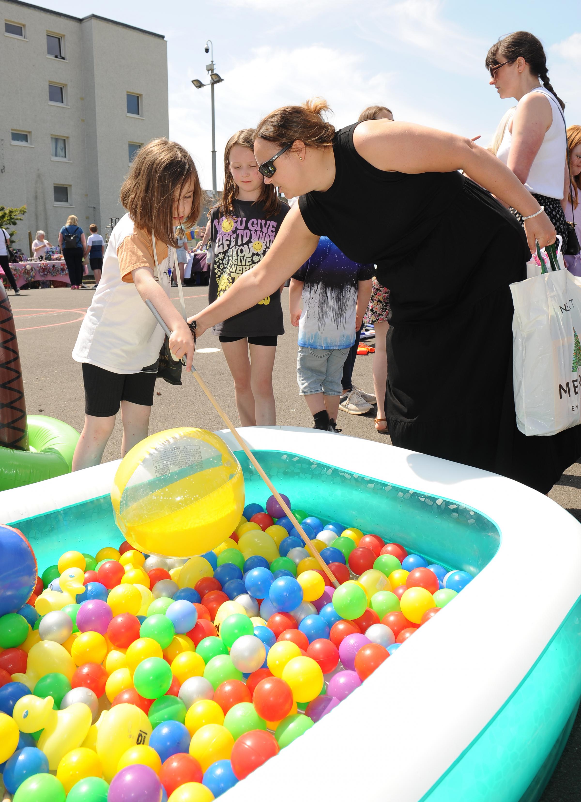 Sunshine and smiles at Kingcase Primary Schools summer fayre on Saturday, June 1. (Image: Charlie Gilmour)